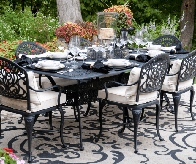 Table Set For A Garden Party - Black Table With Flowers For A Centerpiece