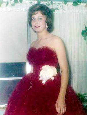 Paying Homage To A Special Aunt - my aunt in a red prom dress with white flower