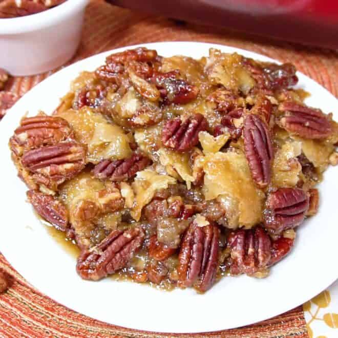 best pecan pie cobbler in a white serving bowl