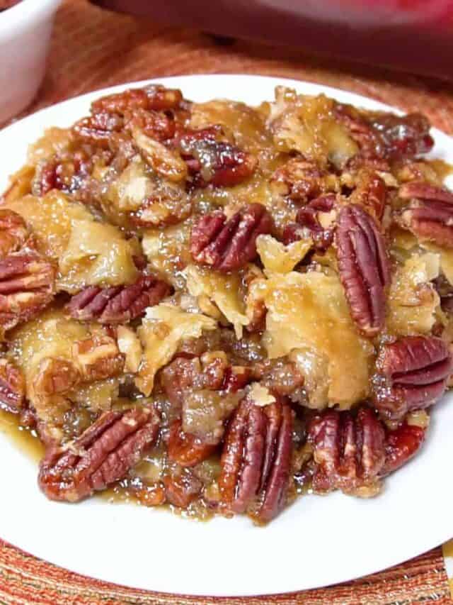 pecan pie cobbler on a white dessert plate