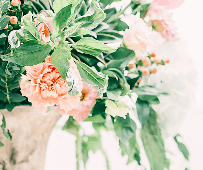 Pretty Centerpiece vase with pink roses and greenery