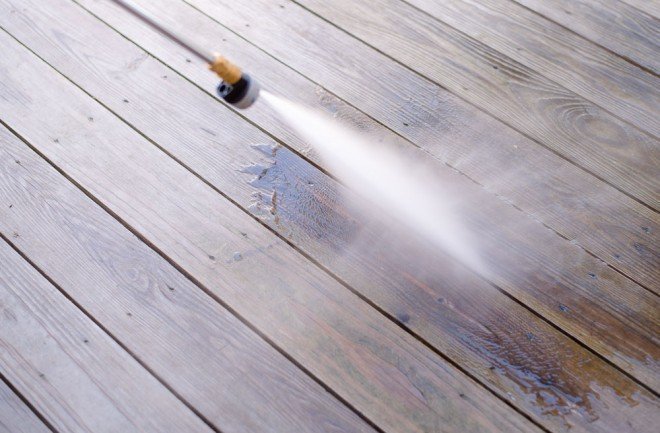 Using a power washer to clean my porch - 5 Ways to Get Your Front Porch Ready for Spring