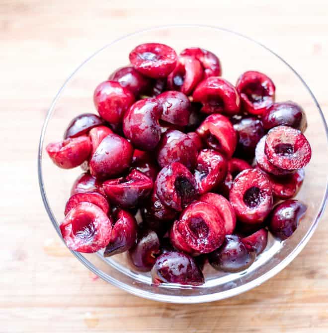 Pitted cherries in a glass bowl