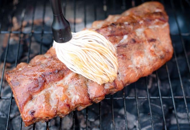 Mopping Ribs with Tropical Basting Sauce