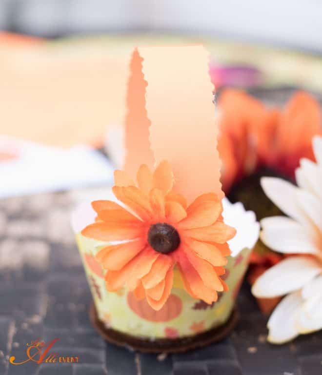 Attach flowers and you're done with the DIY Fall Cupcake Baskets