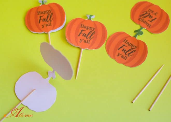 Add cupcake toppers to DIY Fall Cupcake Baskets