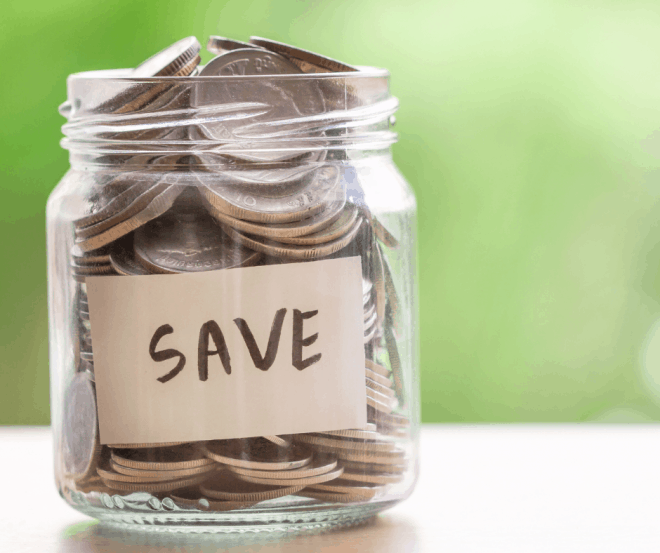 glass jar full of coins with the word save on the front