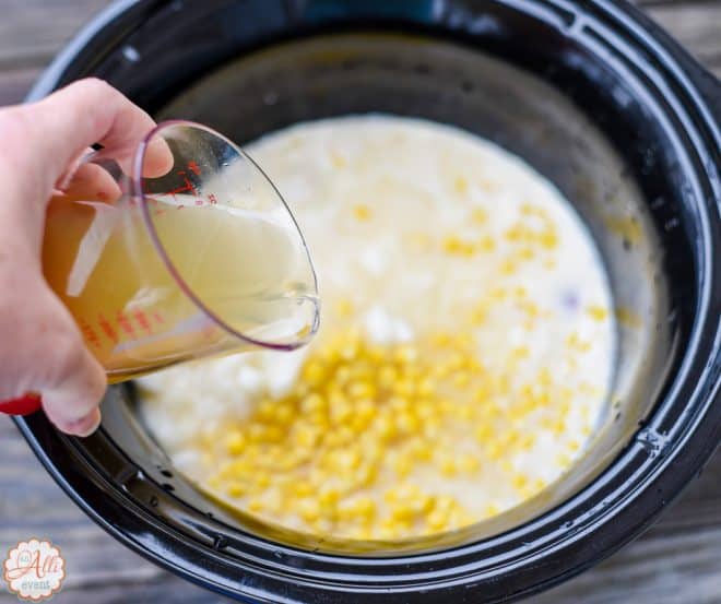 Add chicken broth to bacon-topped corn chowder