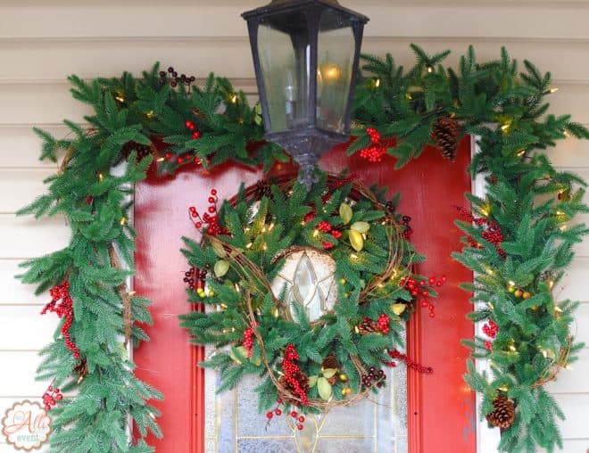 Lighted Garland and Front Door Wreath adds a pop of color to my porch.