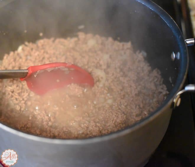 Brown meat and onions to make Chili Chili Bang Bang