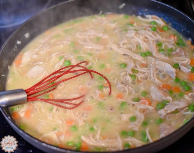 Add chicken broth - Chicken Pot Pies