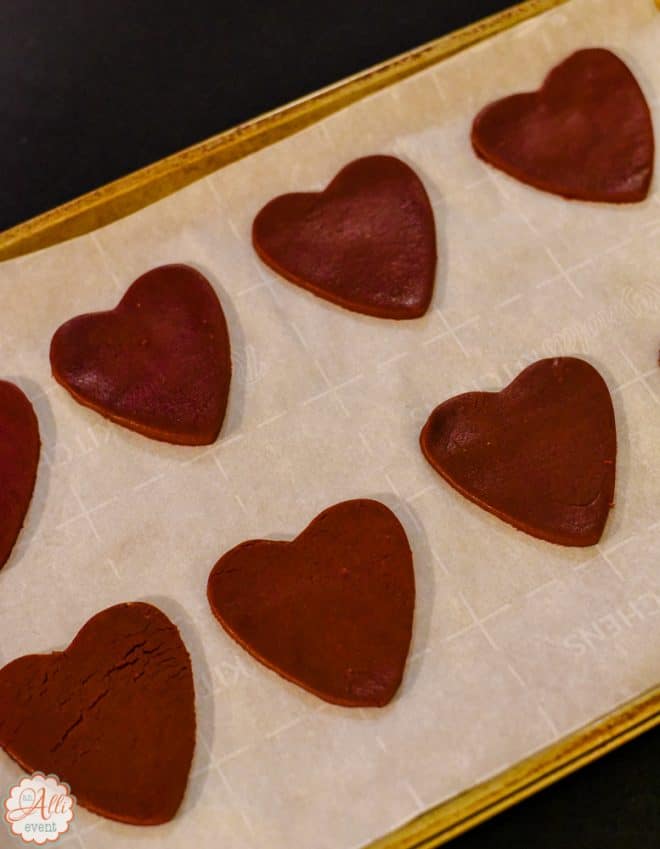 Rolled out Red Velvet Heart Shaped Cookies