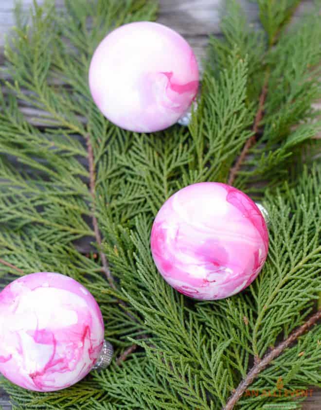 These DIY Marbled Ornaments are so pretty and easy! You can add the marbling in under 5 minutes.