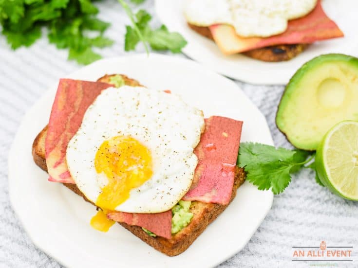 Easy Avocado Toast Topped with Bacon Strips and a Fried Egg