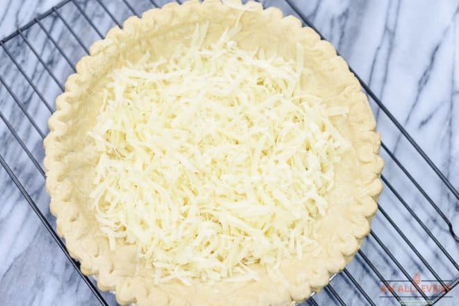 Sprinkle shredded Swiss cheese into the cooled pie crust to make Salmon Quiche.