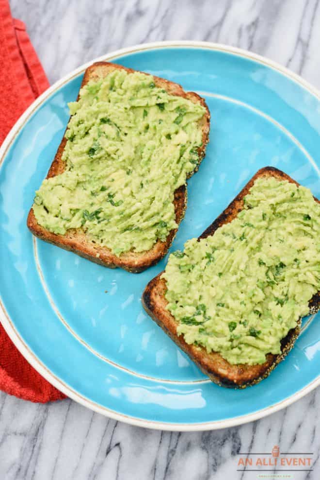 Top toasted multigrain bread with avocado mixture to make Avocado Toast.