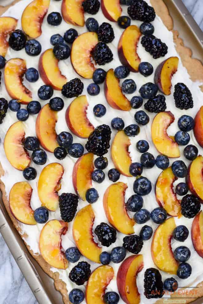 Almond Sugar Cookie Tart with peaches and berries