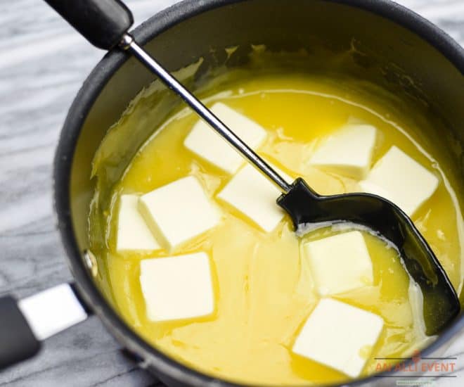 Lemon Curd - Add butter and stir. 