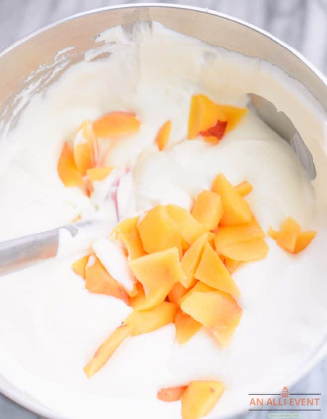 Mix whipped cream, peaches and sweetened condensed milk together