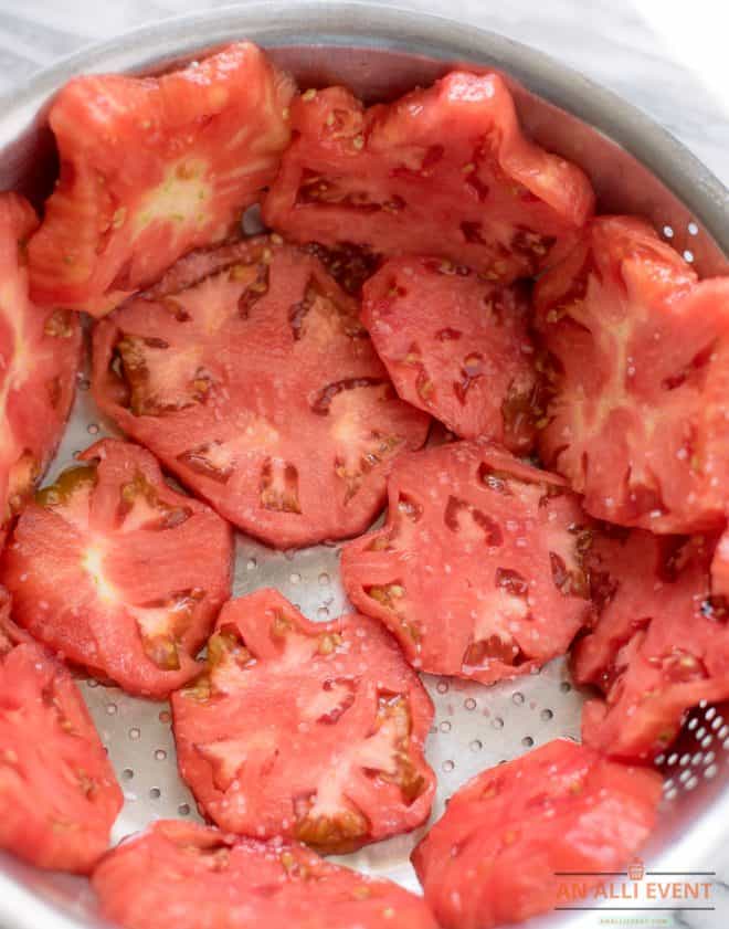 Drain tomatoes for cobbler