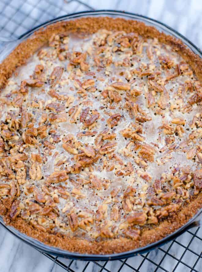 Sweet Potato Pie With Pecan Topping on Cooling Rack