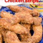 fried chicken strips on a blue serving plate