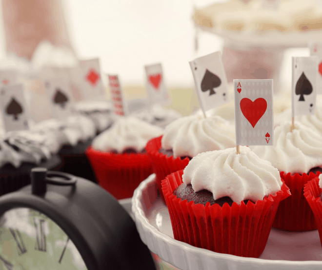 Chocolate Cupcakes With Vanilla Frosting and Picks With Playing Cards 