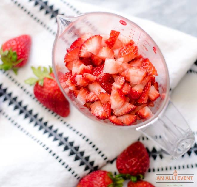 Diced Strawberries in Clear Measuring Cup