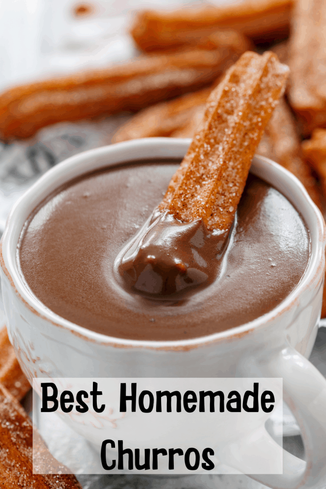 Fried Churros dipped in a cup of chocolate