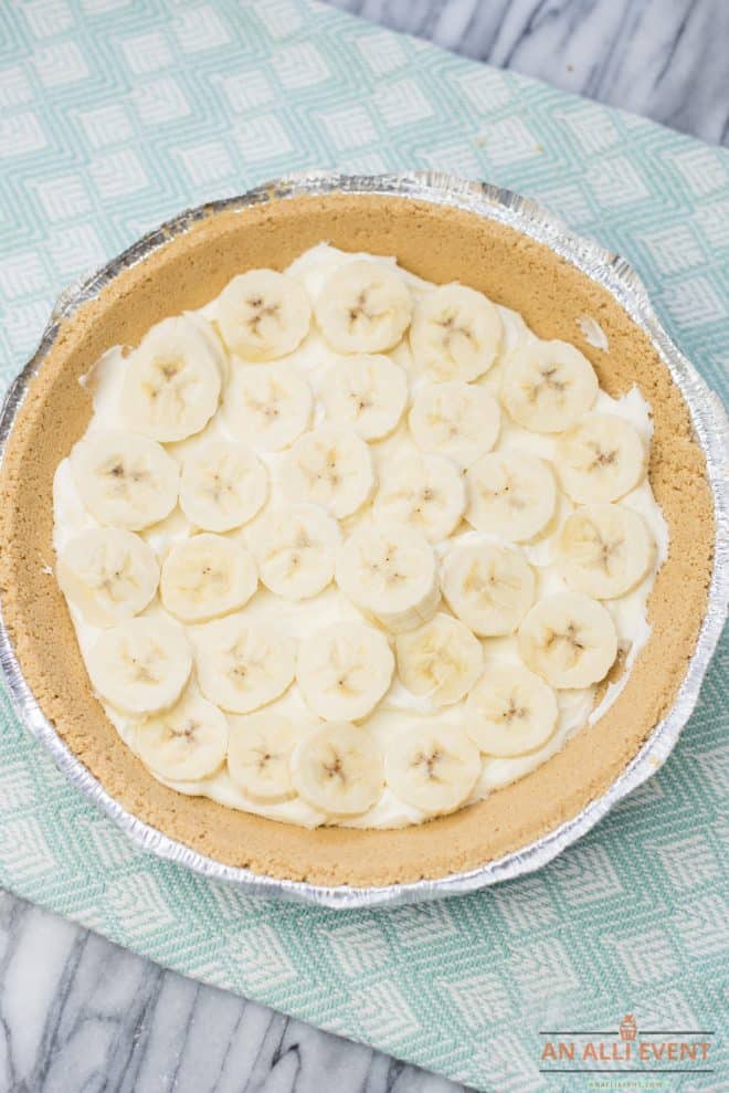 Graham Cracker Crust With Sliced Bananas Over Cream Cheese Mixture