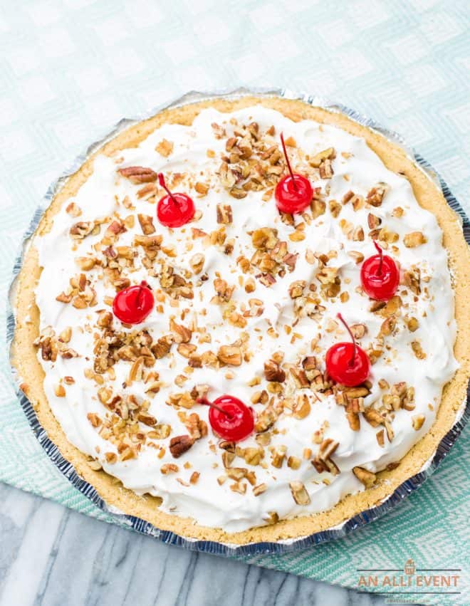 Whole Banana Split Pie on a blue background