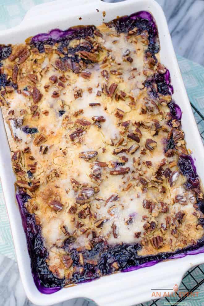 Blueberry Crunch Dump Cake in white baking pan