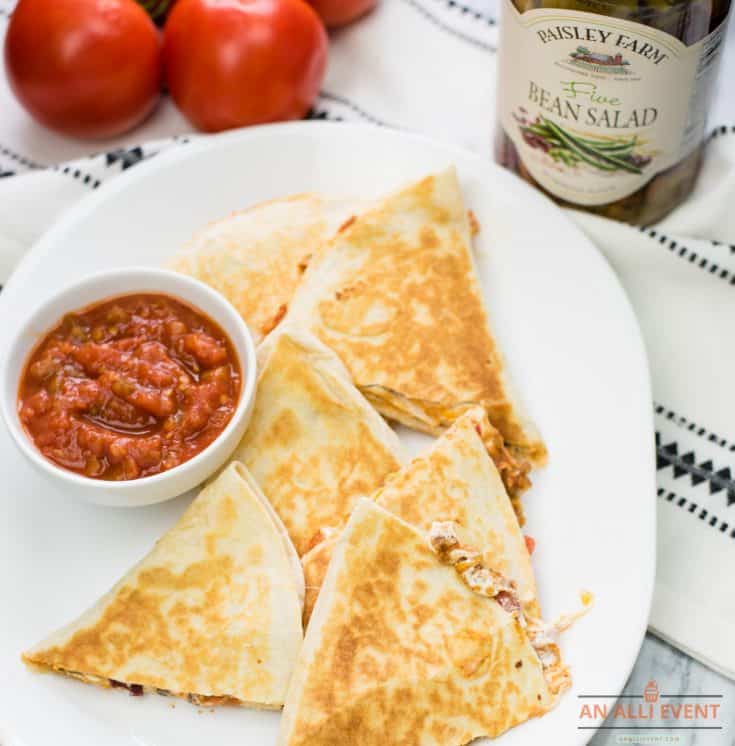 Wedges of Taco Salad Quesadillas on white serving platter