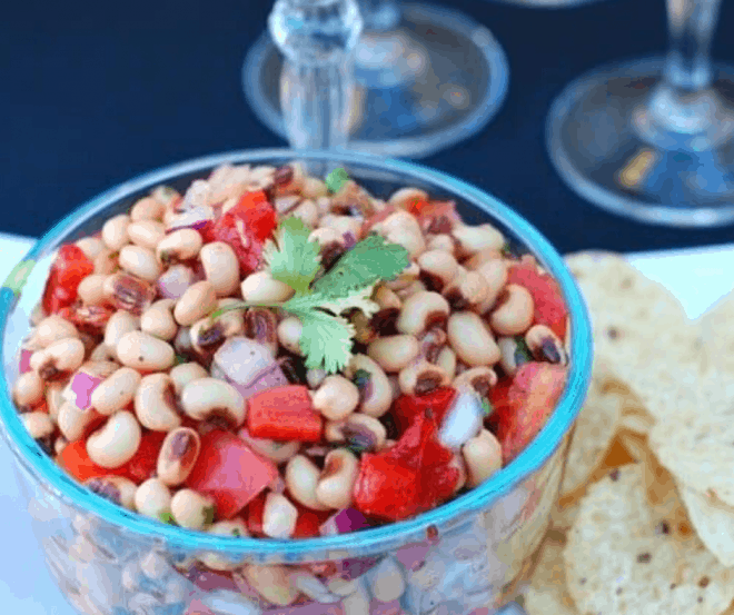 Black-Eyed Pea Salsa in glass bowl with tortilla chips