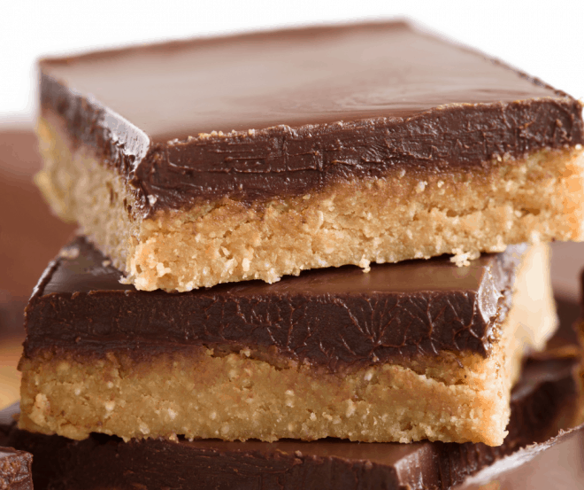 Closeup Photo of Chocolate Peanut Butter Squares stacked on top of each other