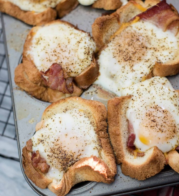 Bacon Egg and Cheese Toast Cups cooling on baking rack