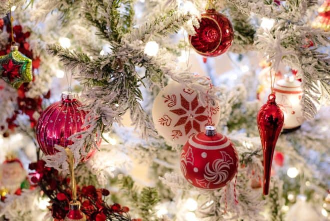 Red and White Ornaments on Flocked Slim Christmas Tree