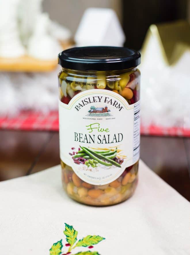 Jar of Five Bean Salad on a linen holiday napkin 