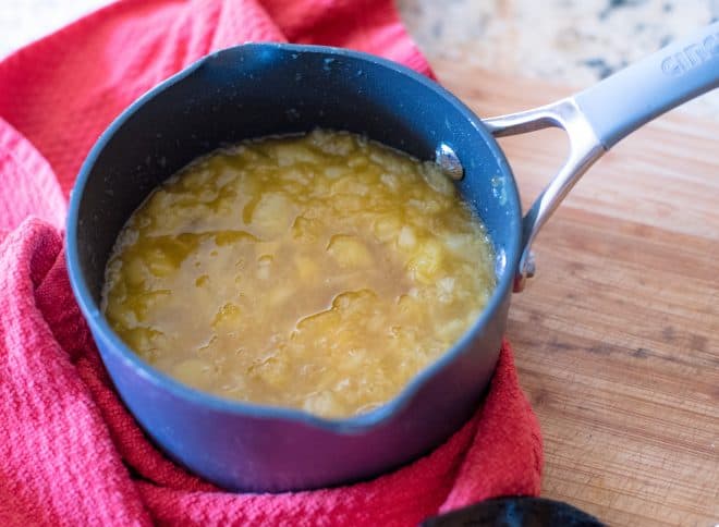 Pineapple Peach Glaze melted together in a small saucepan