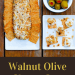 Walnut Olive Cheese Log with olives in a white bolw