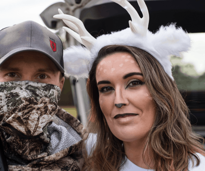 girl dressed up like a deer with white antlers