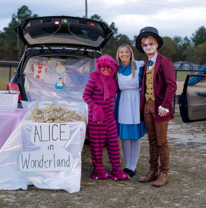 Alice in Wonderland with the cat and Mad Hatter.