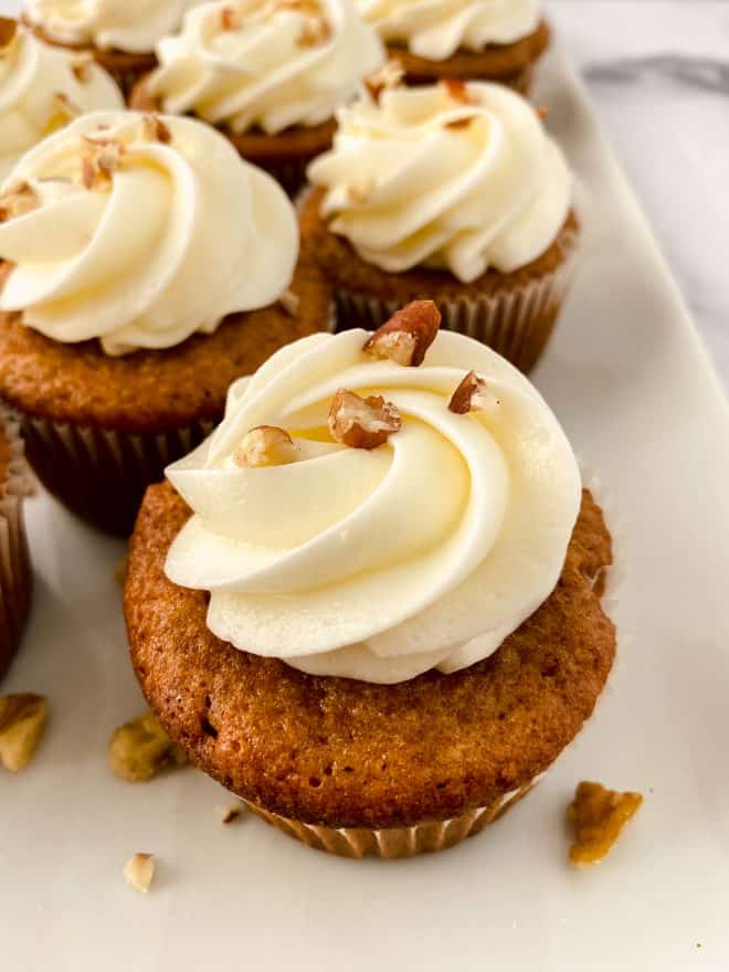 Apple Cider Cupcakes on a white platter