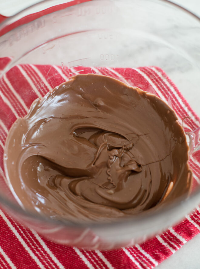 melted chocolate morsels in a glass bowl