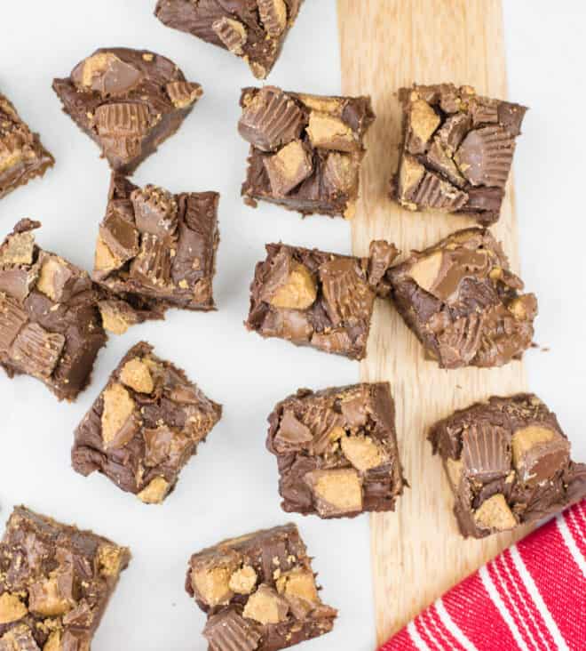 Reese's Peanut Butter Cup Fudge on a white marble cutting board