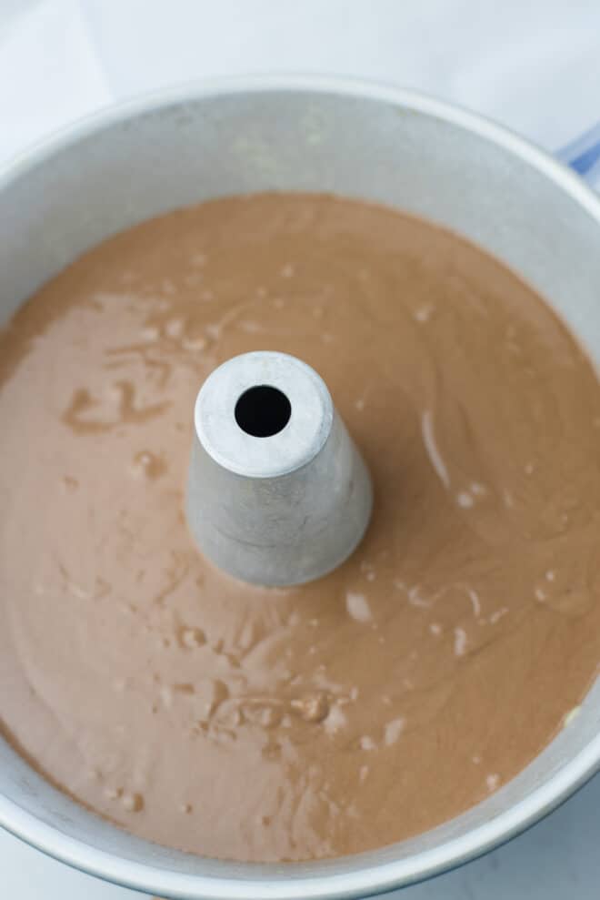 chocolate cake batter in tube pan