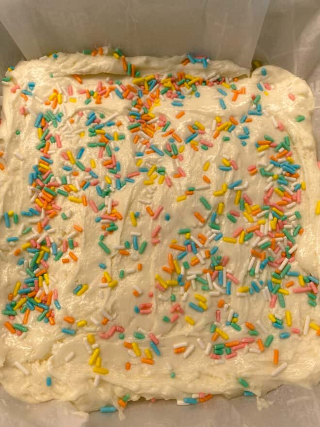 white chocolate fudge in pan ready to cool