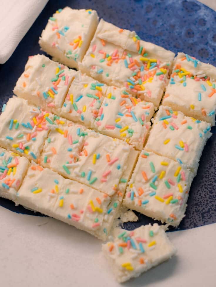 White Chocolate Funfetti Fudge on a blue and white plate