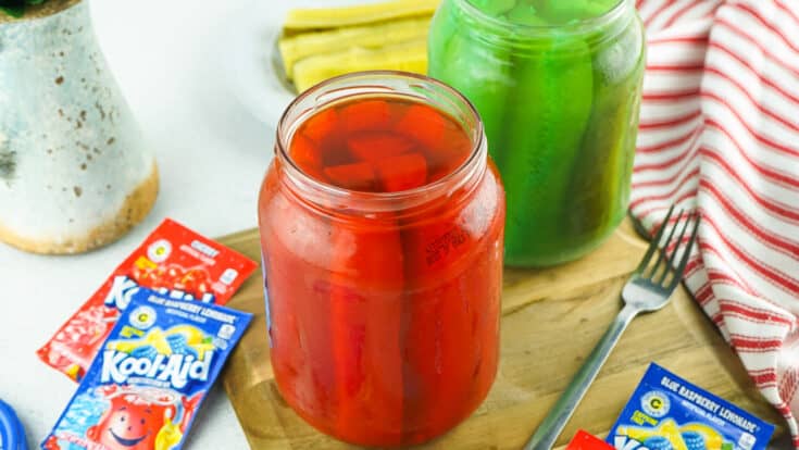 Cherry Kool-Aid Jar of Pickles with a blue jar in the background