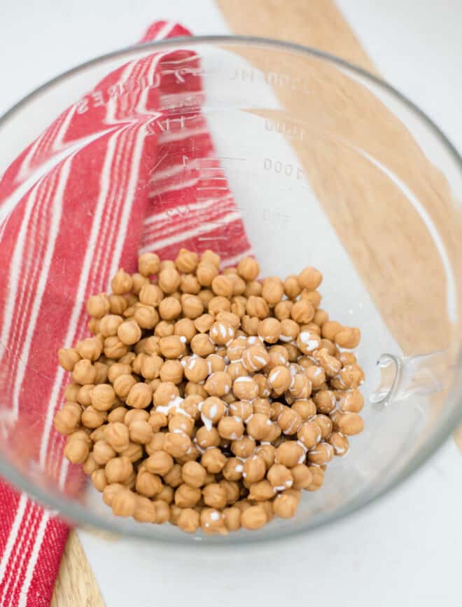 caramel bits and heavy cream in a glass bowl